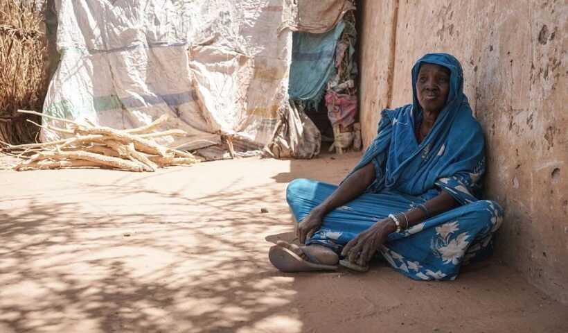 A woman who fled her home due to conflict rests at a centre for displaced people in El Fasher, Darfur.